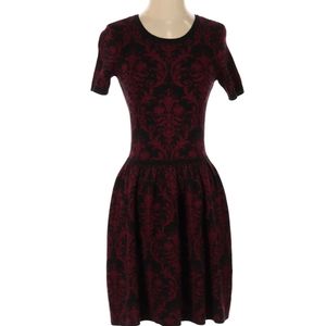 Romeo & Juliet Couture sultry dress with delicate patterned details